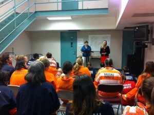 Female inmates being given an educational presentation